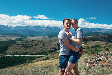 Image showing Loving couple together on mountain