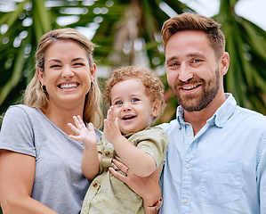 Image showing Family, baby and fun for love, bond and care in the garden outside. Happy parents bonding with their son in the park with loving, caring and affection. Kids, summer and mother and father together