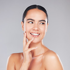 Image showing Beauty, skincare and woman in a studio for wellness, health and natural face or skin routine. Happy, smile and girl model from Asia with a cosmetic facial treatment isolated by a gray background.