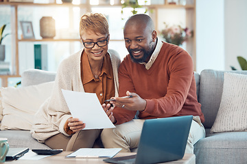 Image showing Finance, paperwork and happy black couple on sofa check bank account, financial statements and report. Budget, saving and middle aged man and woman do online banking on laptop with documents at home