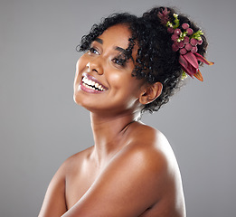 Image showing Black woman, beauty skincare smile with healthy happy glow on body and cosmetics face against studio wall. Makeup model girl, natural shine on skin wellness and health with dark background in Atlanta