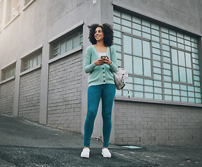 Image showing Black woman, fashion and city travel with phone for location gps, internet map or social media on New York street or road. Smile, happy or cool student or tourist on 5g mobile technology for taxi app