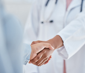 Image showing Handshake, trust and thank you with patient and doctor or medical worker shaking hands, greeting or introduction during consultation. People hand welcome gesture or welcome, partnership or help