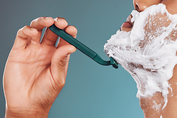 Image showing Shaving foam, razor and skincare mockup with man cleaning his face with care for healthy, clean and smooth skin. Male in studio for dermatology, shaved beard and cosmetics for wellness and health