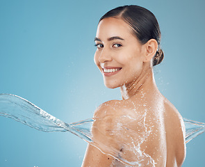 Image showing Water, skincare and beauty model splash cleaning skin for body wellness and health from washing. Portrait of a happy and healthy woman from New York with a smile to show happiness and satisfaction