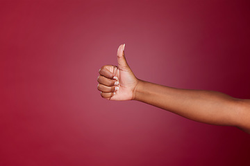 Image showing Thumbs up, yes and agreement hand sign of a black woman showing support, motivation and success. Thank you, goal and happy winner hands gesture to show good news, done goal and achievement victory