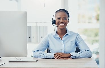 Image showing Call center, smile and portrait of black woman at desk for ecommerce, help and customer support. Happy, receptionist and consulting with employee with headset for advice, representative or commitment