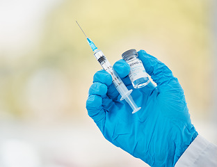 Image showing Covid vaccine, bottle and needle in hand for medical innovation, safety and compliance in hospital, clinic or laboratory. Covid 19 vaccination doctor or pharmacist for corona virus healthcare mock up