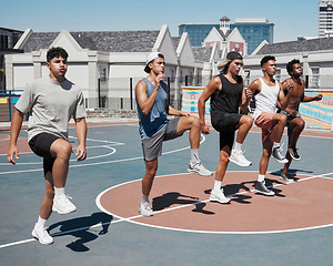 Image showing Basketball, stretching and team training before fitness, exercise and speed performance at basketball court. Workout, basketball players and stretch warm up by men group preparing body for endurance