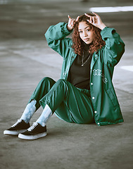 Image showing Fashion, style and devil horns with a model black woman making a hand gesture outdoor in the city. Portrait, trendy and edgy with an attractive young female posing to promote contemporary clothes