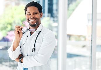 Image showing Smile, portrait and doctor in consulting room for healthcare, surgery and innovation in medicine. Medical, leader and man health worker happy, excited and proud of vision, service and goal in clinic