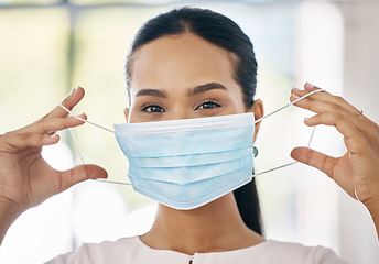 Image showing Face mask, woman and covid healthcare for medical protection, professional safety and covid 19 pandemic vaccine center. Healthcare, a worker with mask and clinic at coronavirus virus treatment clinic