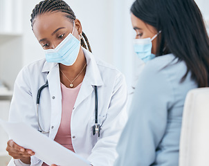 Image showing Healthcare, covid and test results of patient woman in hospital with a black doctor wearing face mask during consultation, discussion and diagnosis. Female medical worker talking about covid 19