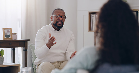 Image showing Therapy, support and psychologist talking to a woman about mental health, depression and anxiety. Psychology, healthcare and African therapist with advice for a patient while counseling in an office