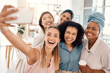 Image showing Office, interracial and women phone selfie with happy smile for diversity, friends and team building. Professional and diverse staff at workplace capture photograph on smartphone for social media.