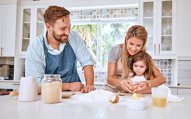 Image showing Mother, father and girl cooking and baking in kitchen having fun, bonding and together. Family, love and parents teaching child to cook, bake and learning chef skills at home for child development