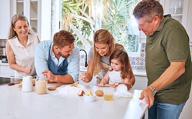 Image showing Grandparents, parents and child baking in kitchen have fun, bond and learning together. Big family, love and mom and dad teaching girl to cook, bake and develop chef skills with grandpa and grandma