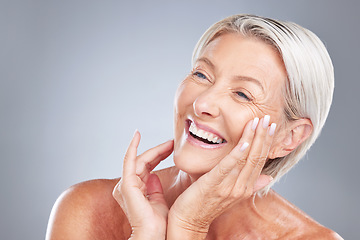 Image showing Skincare, beauty and senior woman with smile isolated in gray background studio. Wellness, dermatology and old female with natural skin and wrinkles pose for cosmetics, makeup and skincare products