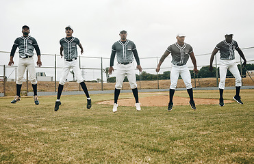 Image showing Sports, baseball and team jump during training, workout or warm up exercise to prepare for game, club competition or match. Softball player, field pitch and group of athlete working on cardio fitness