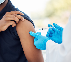 Image showing Covid vaccine, healthcare and patient during consultation with doctor for health, wellness and medicine injection in arm. Medical man in hospital for immunization with clean needle for covid 19 shot