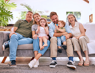 Image showing Children, parents and happy grandparents on sofa, generations of family together in living room. Love, home and couple with kids, grandma and grandpa in Canada relax and smile on couch in family home