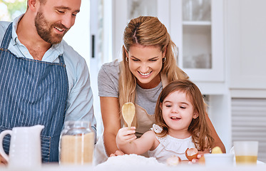 Image showing Cooking, family and bakery food in kitchen with child learning, helping and happy with smile. Family home, mother and dad teaching young kid baking flour recipe for cake, cookies or pancakes.