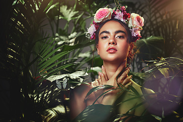 Image showing Beauty, rose and crown portrait of woman with tropical palm plants and natural makeup cosmetics. Flowers, headband and beautiful cosmetic model girl in fantasy floral garden touching skin.