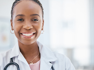 Image showing Black woman doctor, hospital and portrait of young, professional and medical cardiology expert staff working in clinic with mockup space. Happy female healthcare worker consulting service