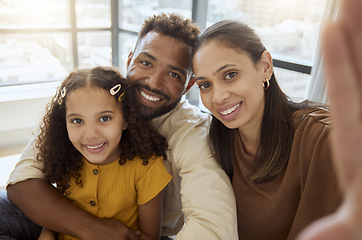 Image showing Black family, selfie and happiness of a mother, father and girl bonding together at home. Portrait of a happy mama, dad and child with quality time, parents love and a hug showing care at a house