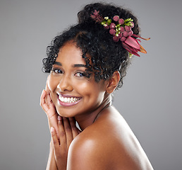 Image showing Black woman, smile and skincare for wellness, being happy and with grey studio background. Natural beauty cosmetics and African American girl being confident, body care and happiness for smooth skin.