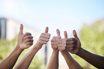 Image showing Diversity, hands and thumbs up in collaboration, teamwork or agreement in solidarity together in the outdoors. Group hand of people in yes, thank you or great gesture for community, trust and support