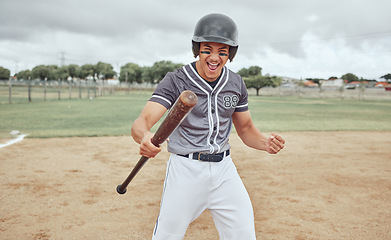 Image showing Baseball, man and winner in sports game, celebration or winning on the pitch in the outdoors. Baseball player in sport celebrating match win, point or score for hitting a home run on the field