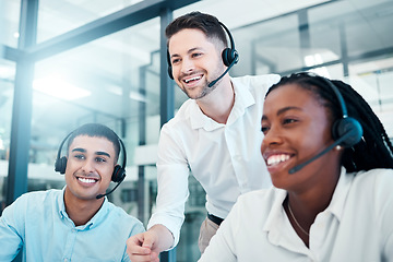 Image showing Customer support, call center and team working together in office, manager helping workers. Diversity, teamwork and boss with consulting agents in customer service, telemarketing and crm workplace