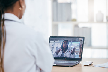 Image showing Video call, discussion and doctors on an online meeting with laptop in the office of clinic. Healthcare workers talking about medicine, surgery and results in online medical conversation on computer.