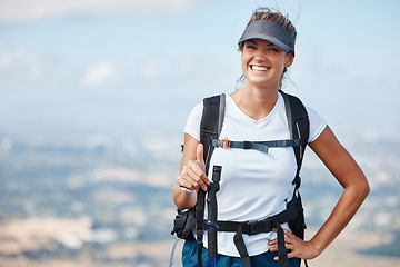 Image showing Hiker woman, hiking and thumbs up outdoor with smile in adventure portrait, travel and success trekking up mountain. Fitness, freedom and happy to win, backpacking and tourist in nature.