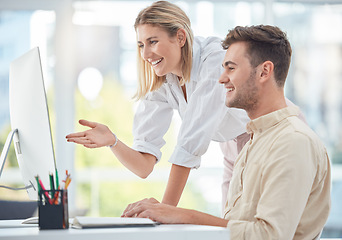 Image showing Teamwork, training and human resources with a business woman helping a man colleague in the office. Computer, manager and mentor with a female employee working with a male coworker on a project