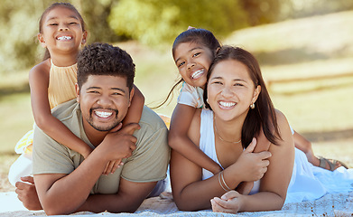 Image showing Happy family, hug and portrait smile for relax, quality bonding time or summer vacation together in the outdoors. Mother, father and children smiling in happiness for freedom, relationship and nature