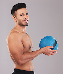 Image showing Fitness, Hispanic man and medicine ball on studio portrait with smile on face and gray background. Exercise, gym and health, happy training workout for healthy athlete from Brazil smiling with ball.