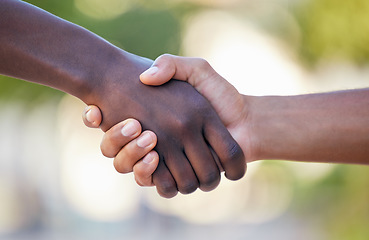 Image showing Teamwork, fitness and handshake by hands in support of training, exercise and healthy lifestyle against bokeh background. Wellness, sports and friends shaking hands before a competitive game outdoors