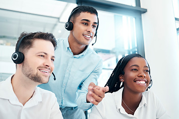 Image showing Call center manager, mentor or coach giving advice and helping team while reading feedback on computer and wearing headset. Telemarketing, customer service and CRM men and woman talking for support