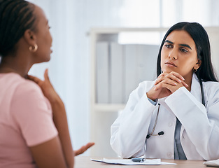 Image showing Doctor, patient consultation and medical healthcare discussion with women at consulting clinic, hospital and community gp. Black woman, office and health care therapist listen during routine checkup