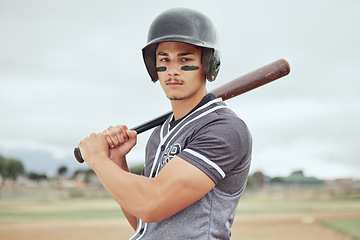 Image showing Man, baseball player and sports bat for game, match or training on the pitch in the outdoors. Professional male in baseball for competitive sport ready to play ball for fitness, exercise or workout