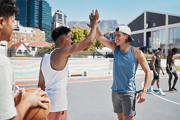 Image showing Basketball, high five and sports team hands in celebration of game win, match or training. Teamwork, sport and fitness by basketball player hand in support of motivation, success and goal at court