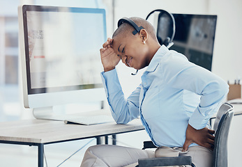 Image showing Black woman, backache and stress in call center with consultant suffering pain, muscle or spinal injury at her desk. Back, pain and burnout by crm manager with headache and posture problem in office