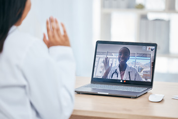 Image showing Doctor, video call and wave with a health professional consulting with a colleague on a laptop screen. Healthcare, insurance and advice with a female medicine worker and coworker in a virtual meeting