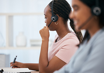 Image showing Black woman, notebook writing or headset in call center, contact us or crm consulting office in telemarketing help. Receptionist, consultant agent or customer support workers in communication company