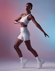 Image showing Fitness, health and black woman stretching in studio portrait of healthy girl. Sports, exercise and form, motivation and balance for athlete cardio training for aerobics workout and woman in Jamaica.