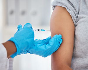 Image showing Covid vaccine, needle and patient getting an injection from a doctor with gloves at a medical clinic. Healthcare, medicine and nurse giving a antibody vaccination to prevent coronavirus at a hospital