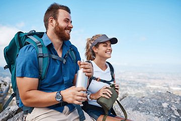 Image showing Happy, couple and relax for hiking, backpacking or travel with smile on adventure together in the outdoors. Man and woman smiling in happiness for trekking journey, trip or hike on mountain cliff