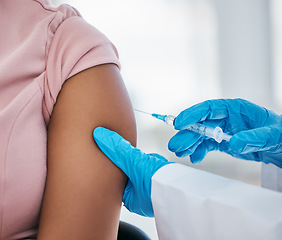 Image showing Healthcare, arm and covid vaccine by doctor in consultation room, compliance and gloves closeup. Hospital, hand and injection on woman patient, needle and innovation in science, medical and medicine